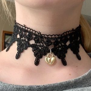 Cool black choker with gold lock *open for offers*